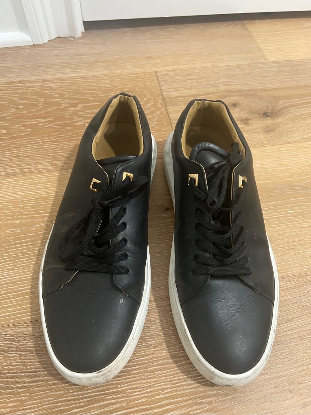 Buscemi Black Leather Low-Top Sneakers with White Sole and Gold Eyelets